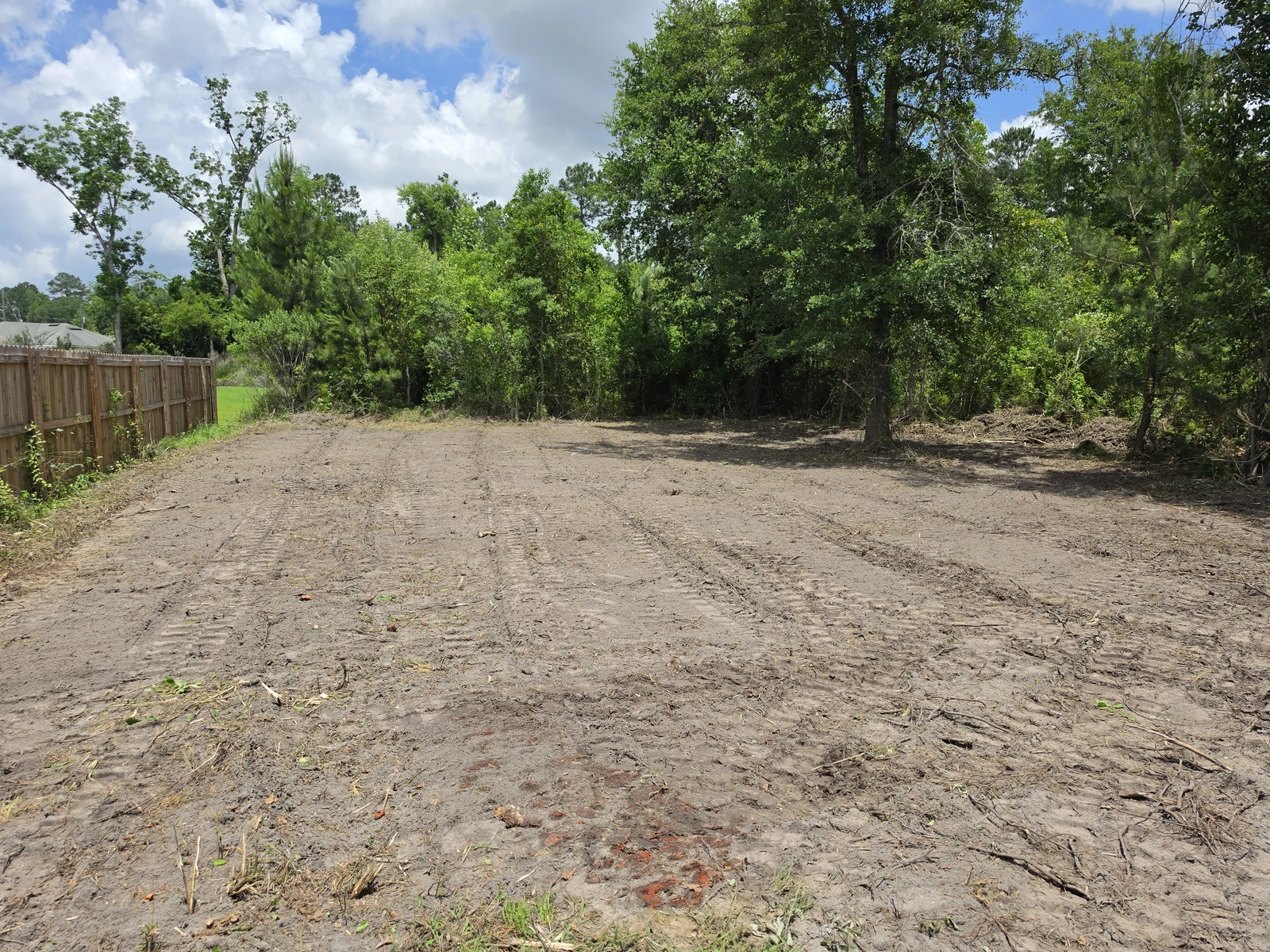Finished cleared acreage with track loader tread patterns in Valdosta GA